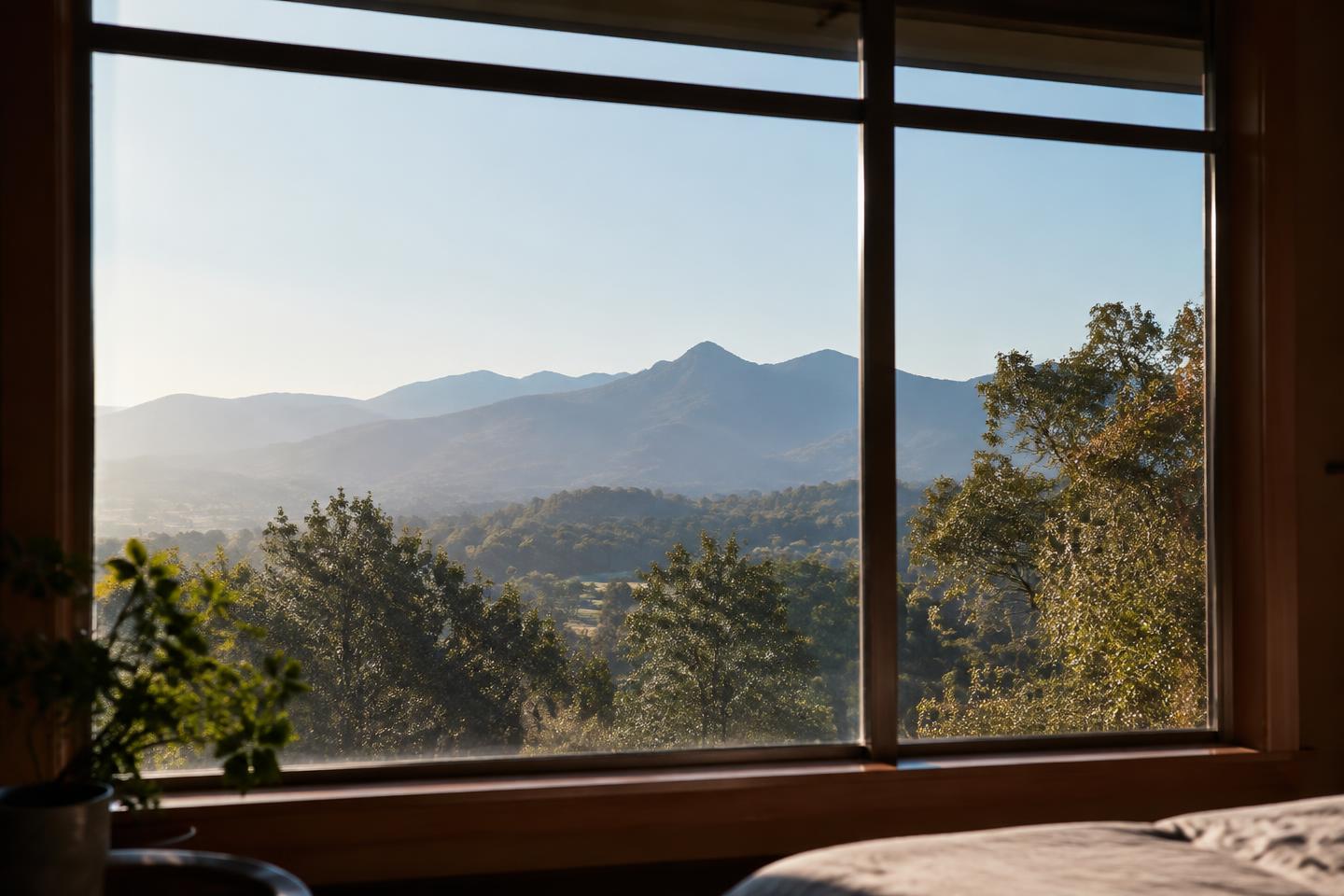A private home window overlooking distant Northern California foothills.